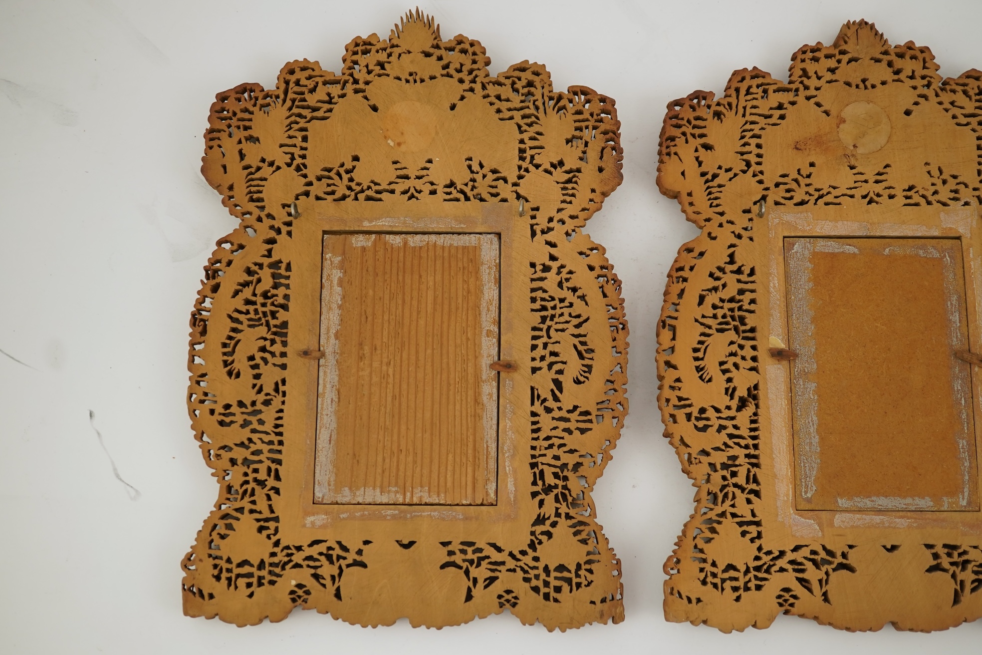 A pair of Chinese carved sandalwood frames, late 19th century
